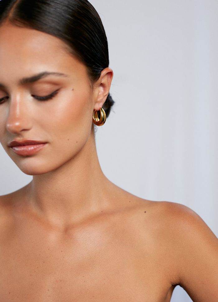 ANNI LU - Golden curve hoops bold Gold